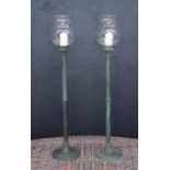 Good pair of French floor-standing copper Bougeoirs candle holders with shaped glass storm shades,