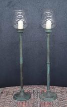 Good pair of French floor-standing copper Bougeoirs candle holders with shaped glass storm shades,