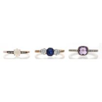 18ct sapphire and diamond three stone ring, the sapphire 0.40ct approx, the diamonds each 0.20ct