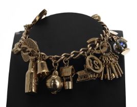 9ct charm bracelet, 40.7gm (225)