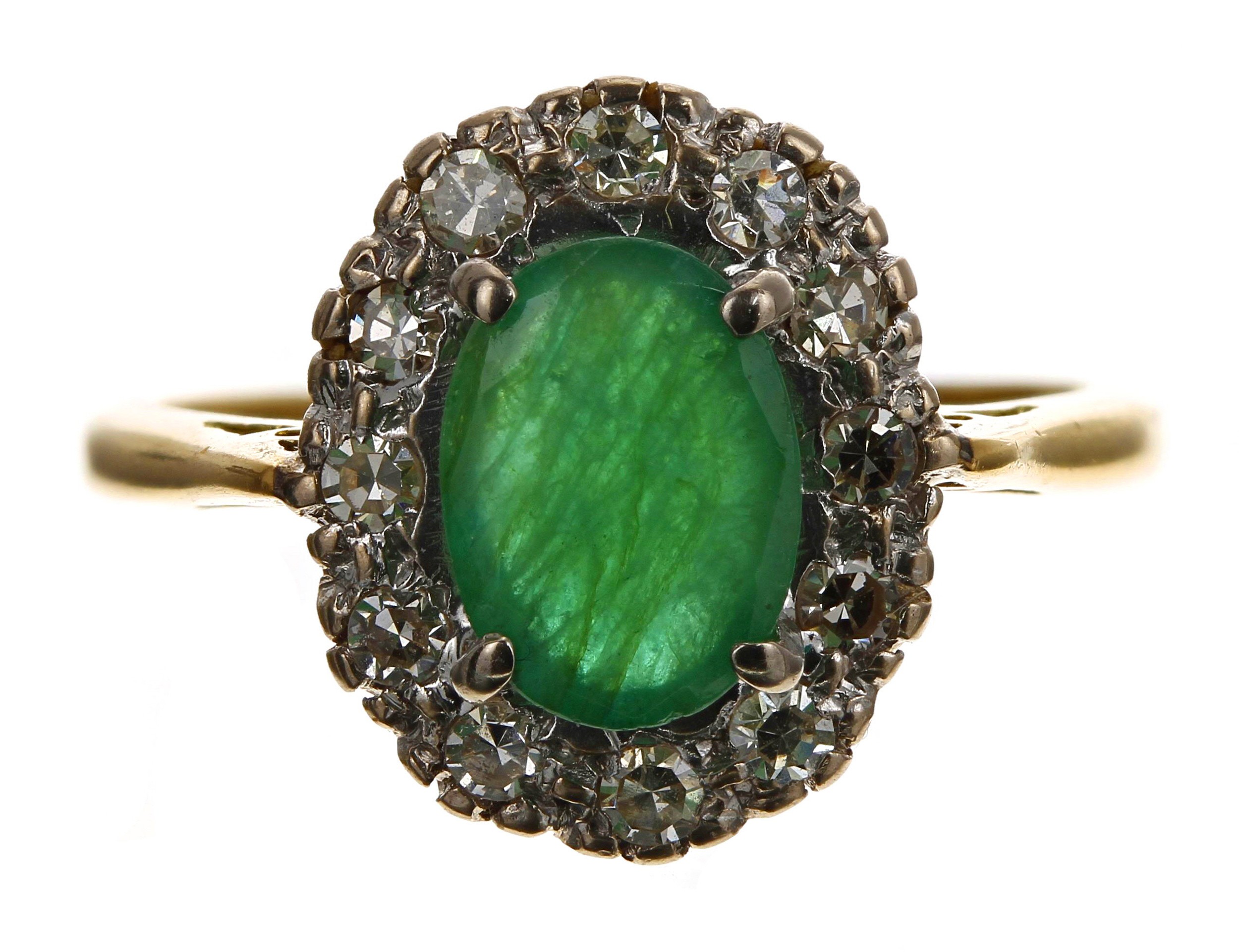 Attractive 18ct yellow gold oval-cut emerald and eight-cut diamond halo scalloped ring, the