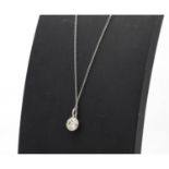 White gold diamond solitaire pendant on a Tiffany & Co. 18ct white gold necklace, 1.00ct approx,