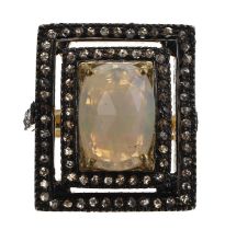 Large rectangular silver-gilt dress ring set with an oval cabouchon white opal and rose-cut diamonds