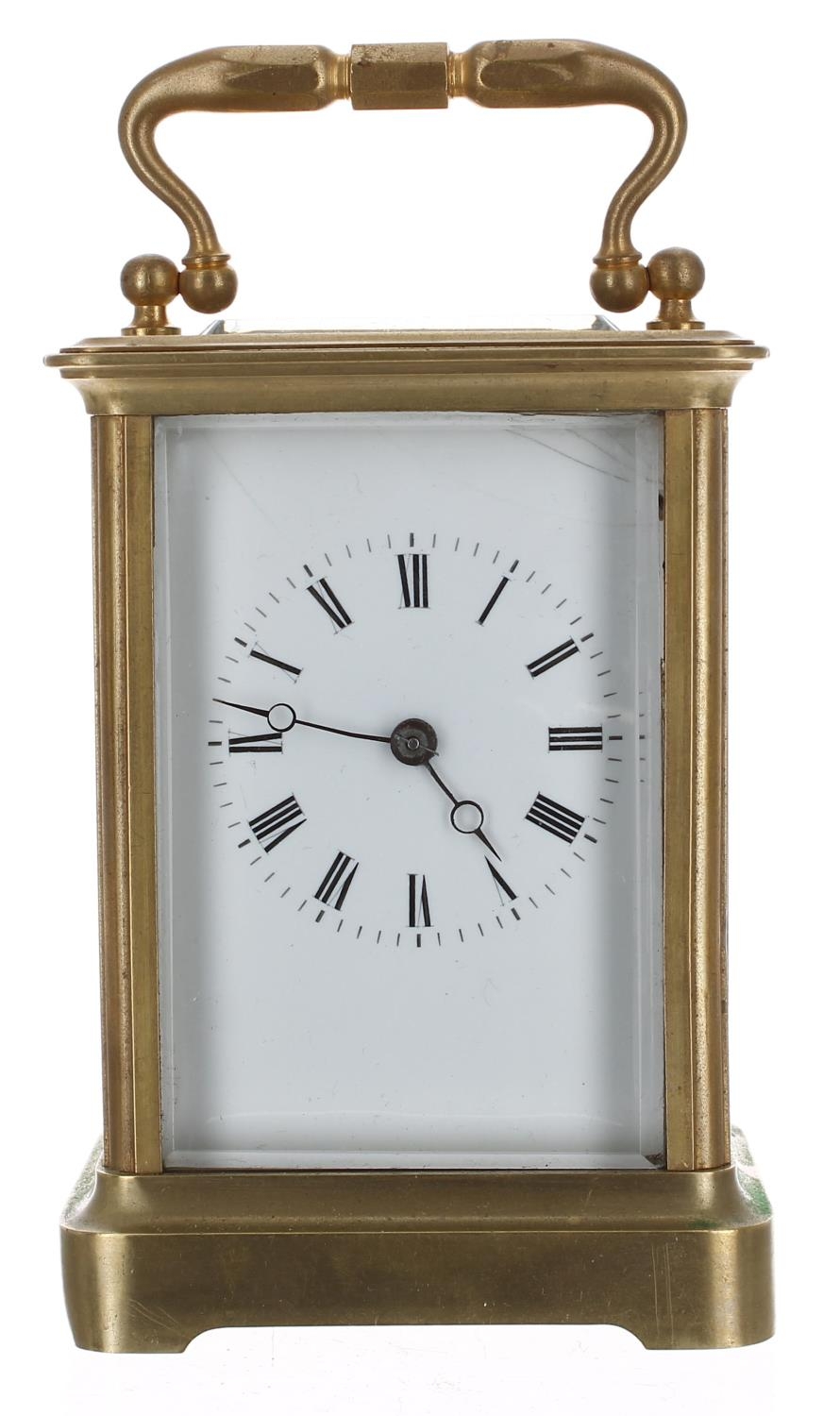 French brass carriage clock striking on a bell, within a corniche brass case, 6.5" high (key);