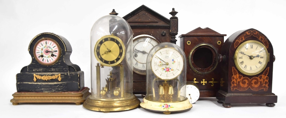 Four various wooden case mantel clocks, all in need of restoration; also two contemporary torsion