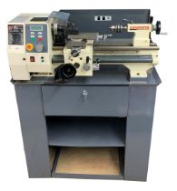 Axminster Sieg C4 metal bench lathe (part no: 600856), upon a bespoke stand fitted with a long draw