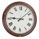 G.P.O. electric 18" wall dial clock within a turned mahogany surround