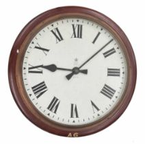 G.P.O. electric 18" wall dial clock within a turned mahogany surround