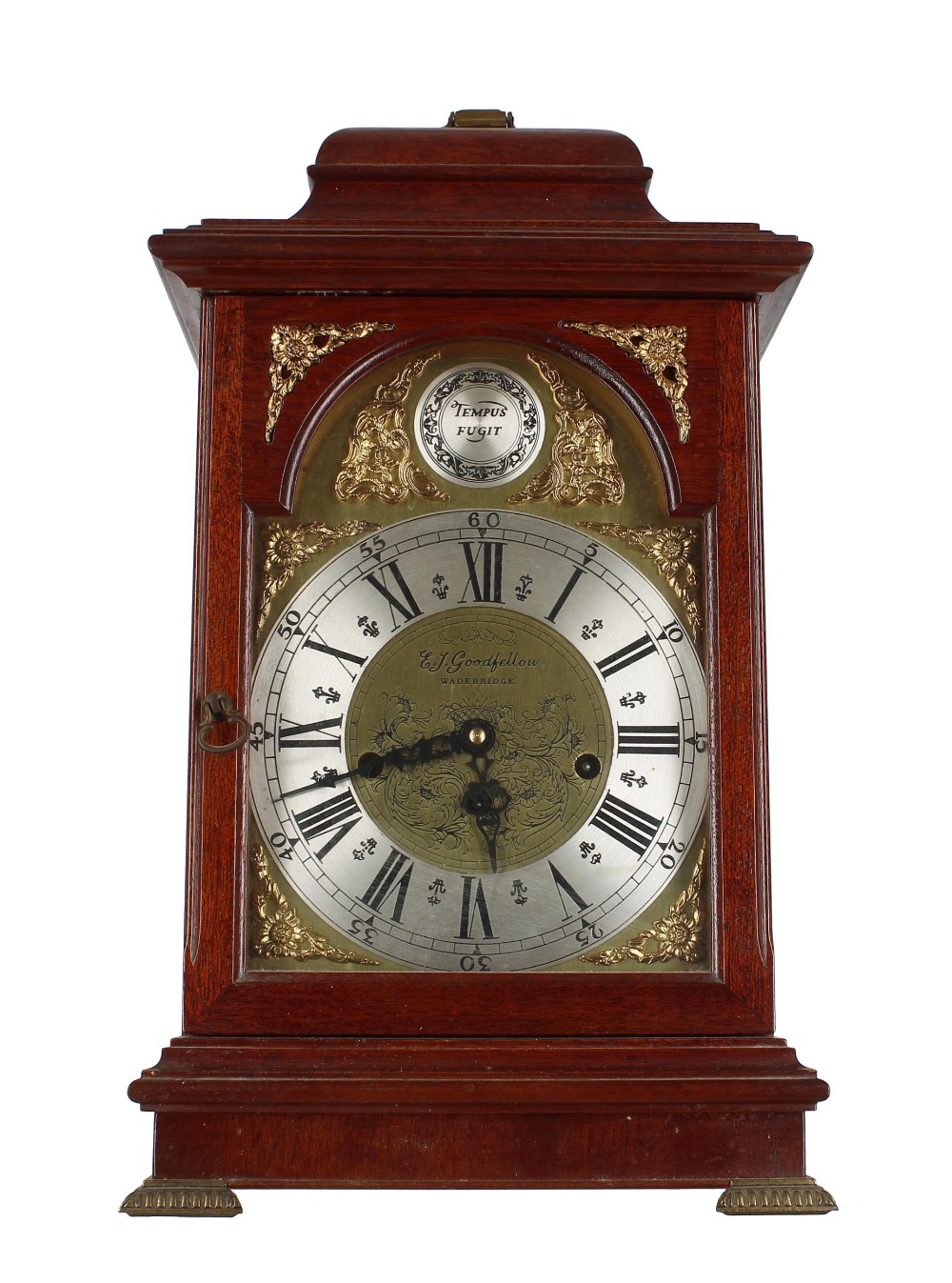 Contemporary mahogany three train bracket clock, the 7" silvered chapter ring enclosing a foliate