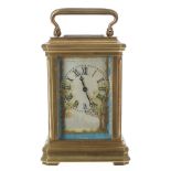 Miniature contemporary carriage clock timepiece with painted porcelain panels, the movement back