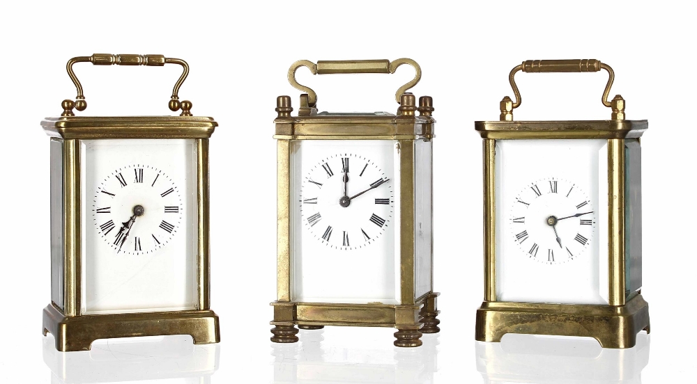 Three brass cased carriage clock timepieces, all approximately 5.75" high (3)