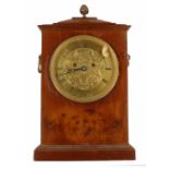 English maple two train mantel clock striking on a gong mantel clock, the 5.5" foliate engraved gilt