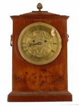 English maple two train mantel clock striking on a gong mantel clock, the 5.5" foliate engraved gilt
