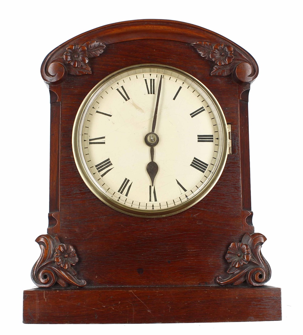 Mahogany single fusee bracket clock, the 6" cream dial within a rounded arched case with applied