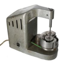 Good Rollimat electric clock pivot polishing  machine, within a light grey case, 9" high *The