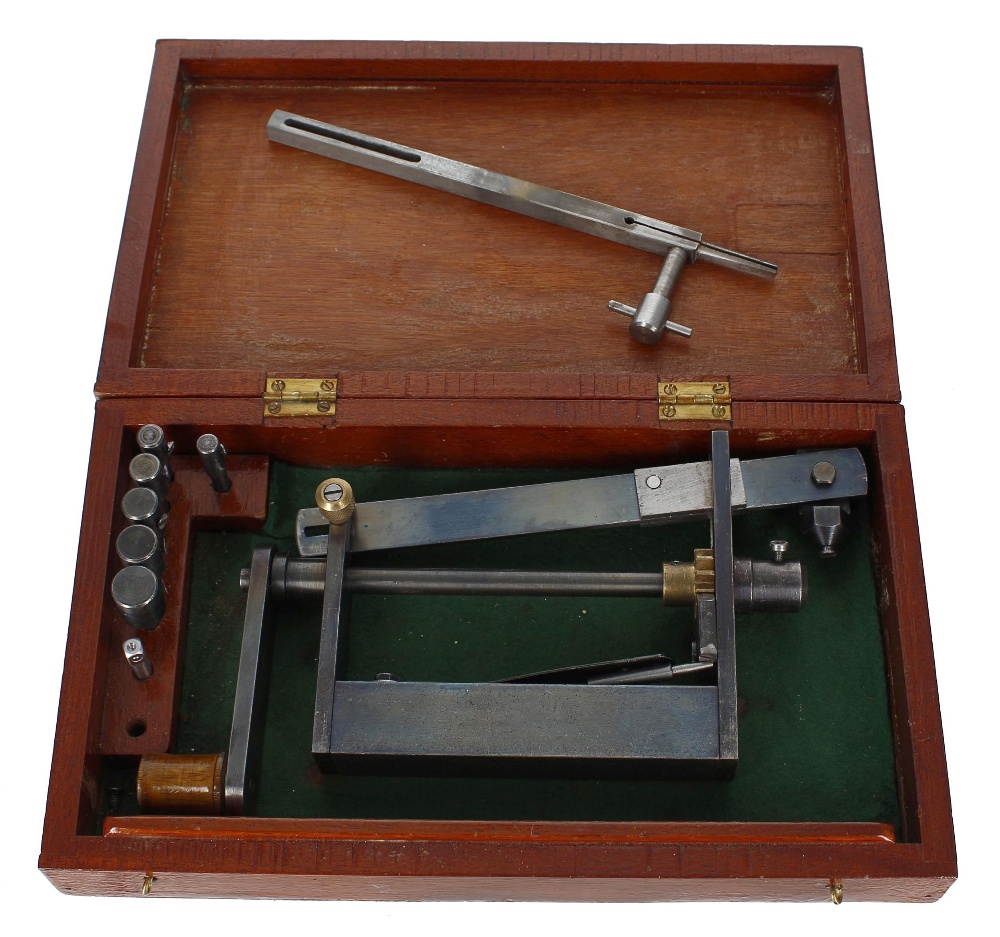 Clock mainspring winder made after a design by John Wilding, within a fitted mahogany box with