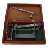 Clock mainspring winder made after a design by John Wilding, within a fitted mahogany box with