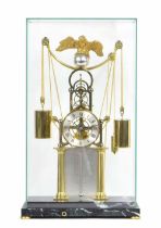 Unusual contemporary clock by and signed F.H. Whitlock, the 4" silvered chapter ring enclosing a