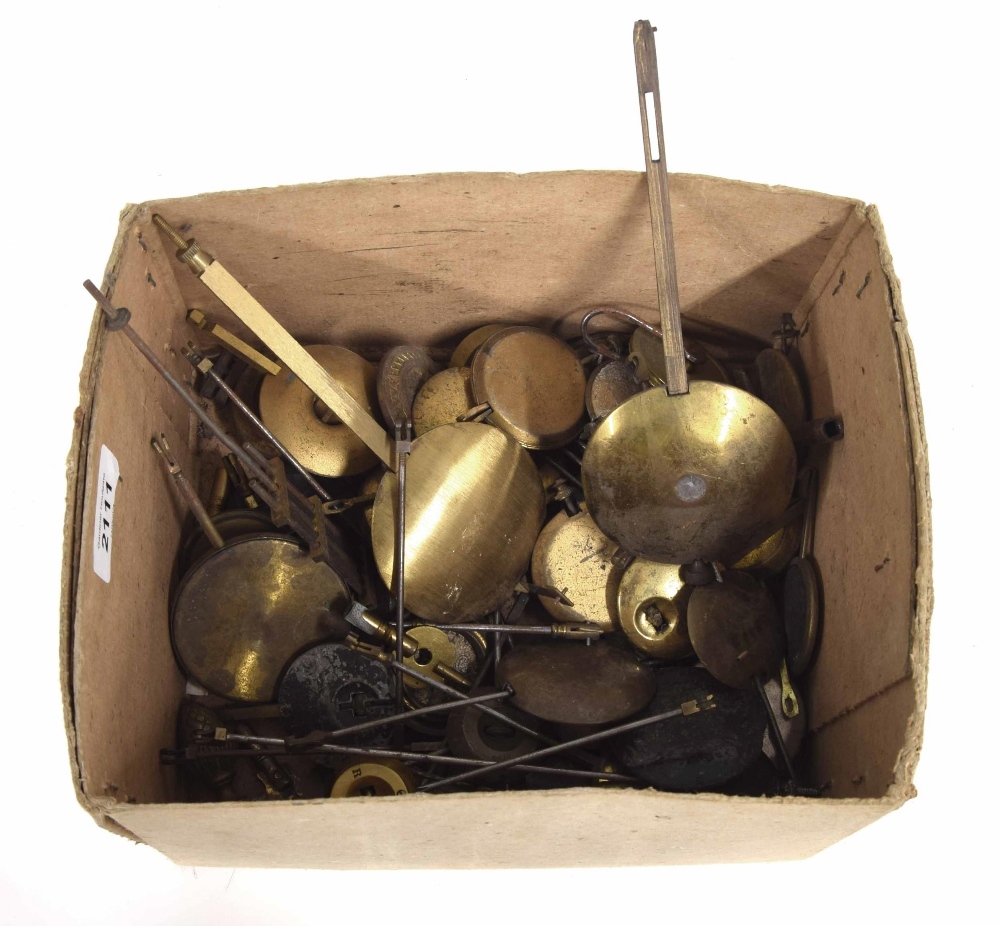 Large quantity of small clock pendulums and bobs