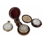 Three pocket barometers in need of some restoration, one signed Aitchison, London & Provinces, case;