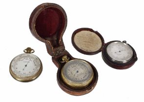 Three pocket barometers in need of some restoration, one signed Aitchison, London & Provinces, case;