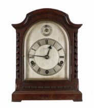English oak three train mantel clock, the 5.5" silvered arched dial signed Botly & Lewis, Reading,