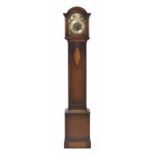 Oak three train grandmother clock chiming on eight rods, the 8" brass arched dial with silent/