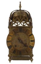 Brass two train lantern clock case with later movement, the 6.5" brass dial enclosing a foliate