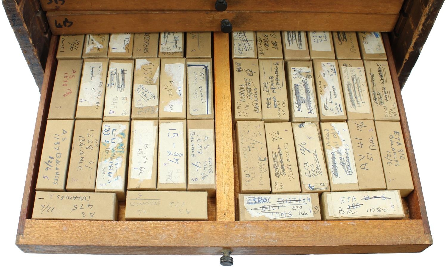 Twelve drawer wooden chest containing a quantity of watch parts including balances, stems, wheels, - Image 8 of 10