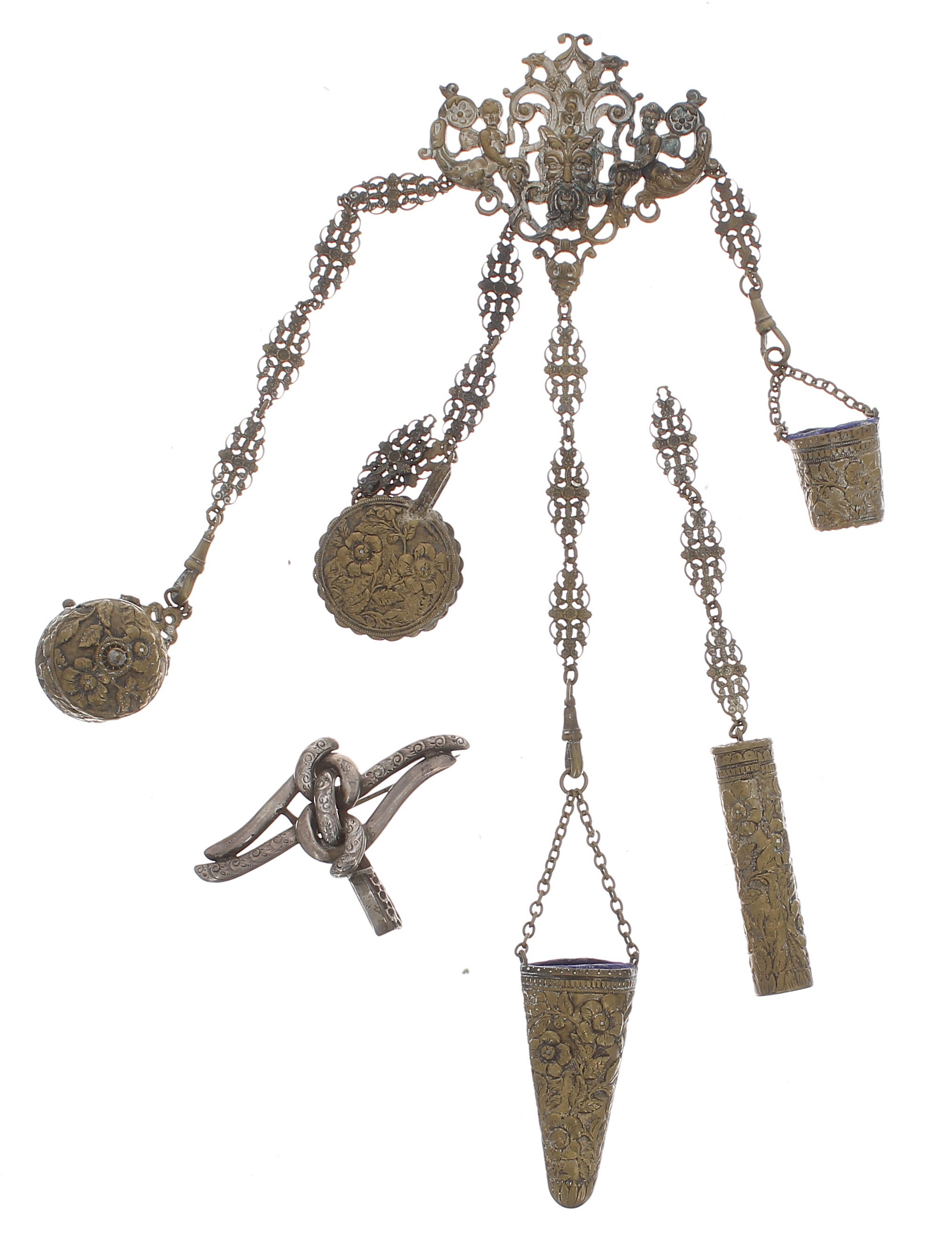 Brass chatelaine with various attachments; together with a white metal chatelaine brooch/clasp (2)