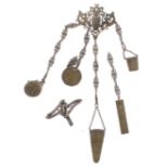 Brass chatelaine with various attachments; together with a white metal chatelaine brooch/clasp (2)