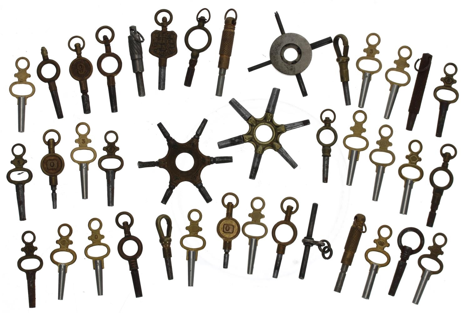 Collection of assorted pocket watch keys to include two spider keys and a trade key (38 approx)