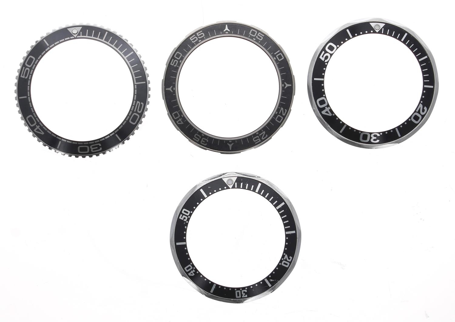 Omega - Four bezels with black inserts