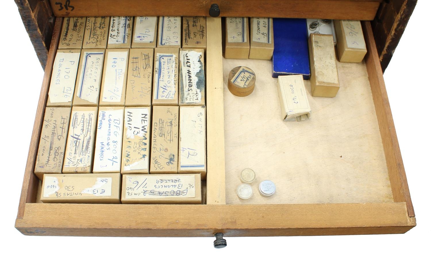 Twelve drawer wooden chest containing a quantity of watch parts including balances, stems, wheels, - Image 9 of 10