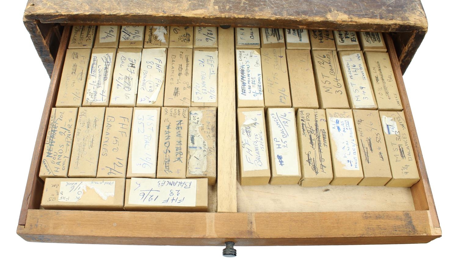 Twelve drawer wooden chest containing a quantity of watch parts including balances, stems, wheels, - Image 10 of 10