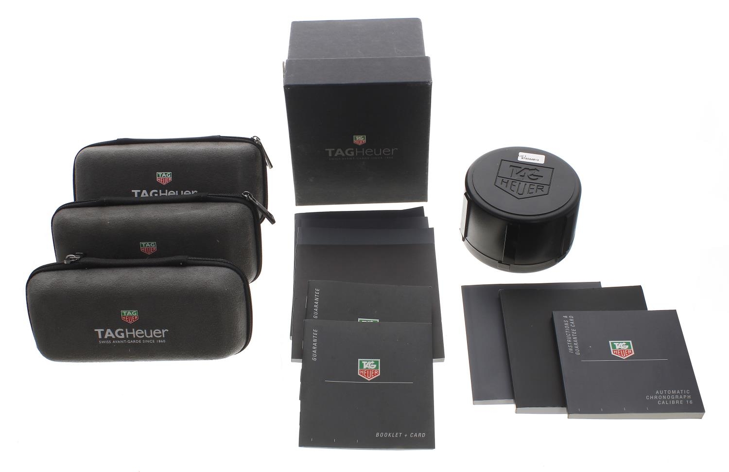 Tag Heuer - Three Tag Heuer grey zipped wristwatch pouches; together with a Tag Heuer watch box with