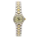 Longines Conquest lady's two-tone wristwatch, reference no. L1 130 3, champagne dial, quartz,