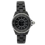 Chanel J12 black ceramic lady's wristwatch, serial no. O.S 04xxx, circa 2012, rotating bezel, the