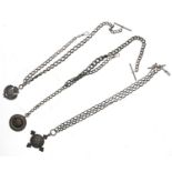 Three curb link watch Albert chains, each with silver fobs including one with an enamel dart