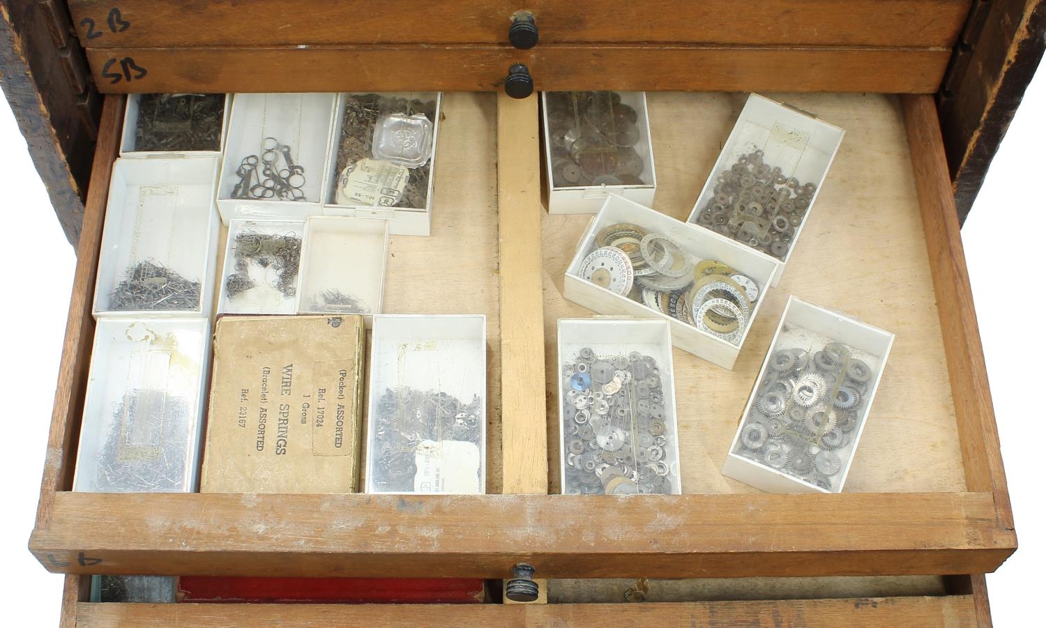 Twelve drawer wooden chest containing a quantity of watch parts including balances, stems, wheels, - Image 6 of 10