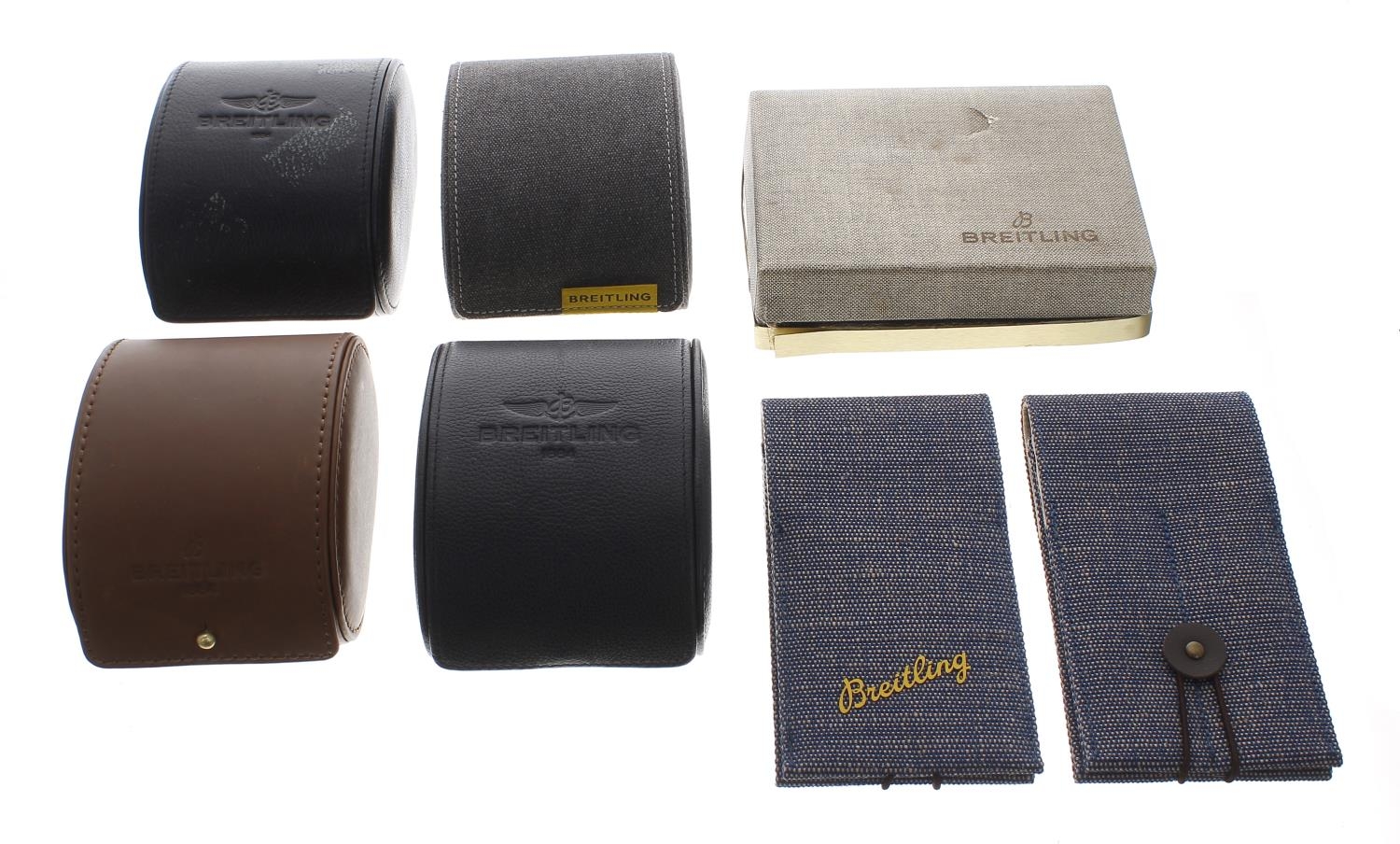 Breitling - Four assorted Breitling wristwatch pouches; together with two Breitling wristwatch strap