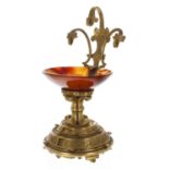 Good Aesthetic ormolu pocket watch stand with calendar, with three supports over a carnelian oval