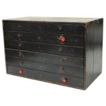 Six drawer wooden chest containing a quantity of watch mainsprings