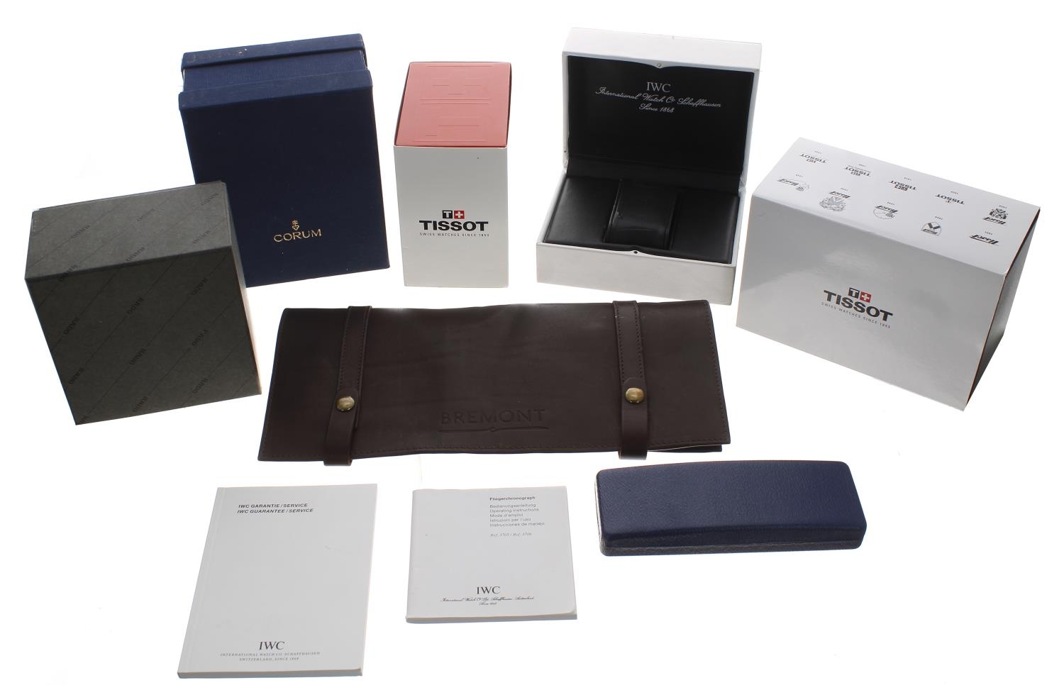 Two Tissot wristwatch boxes; together with a Bremont wristwatch pouch; Rado wristwatch case with