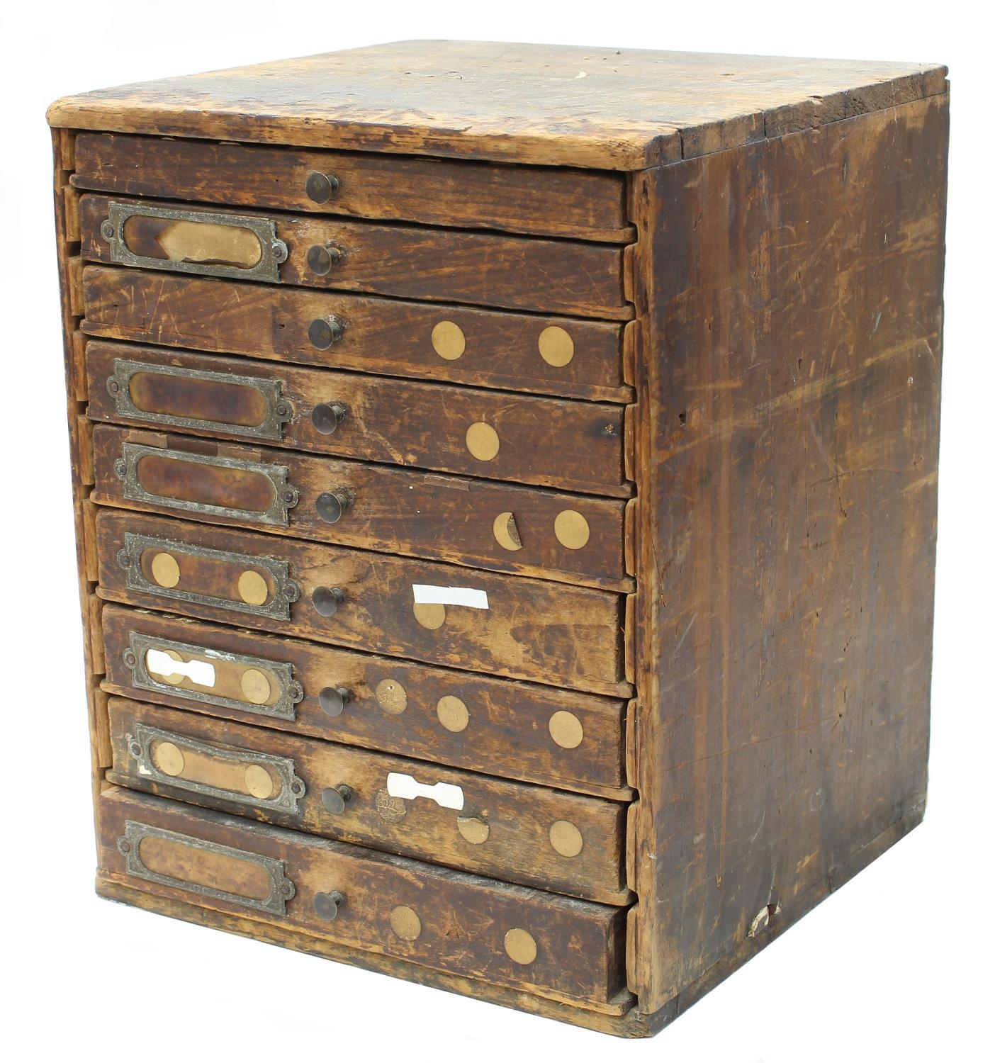 Nine drawer wooden chest containing a quantity of watch parts to include balance staffs, balances