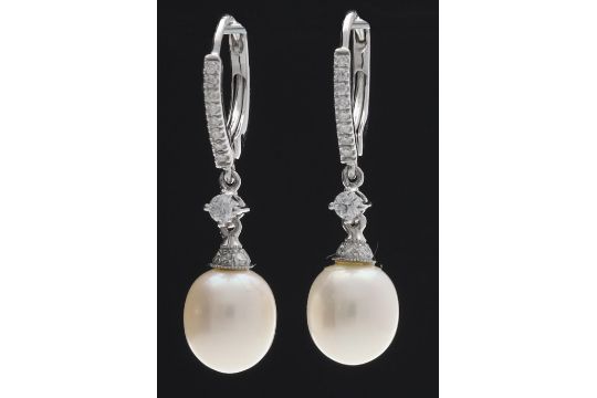 Pair of 18ct white gold cultured pearl and diamond earrings, the pearls 7mm, hinged backs, 3.6gm,