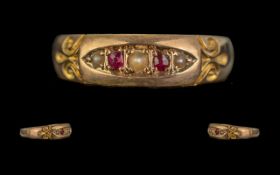 Ladies 15ct Gold - Ruby and Seed Pearl Set Dress Ring. Marked for 15ct Gold. Approx Size R. Approx