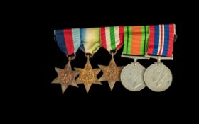 WW2 Group Of 5 Medals On Bar, The 1939-45 Star, Atlantic Star, Italy Star, Defence And War Medal.