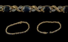 Ladies 9ct Gold Sapphire & Diamond Set Line Bracelet. Stamped for 9ct Gold. Approx Length 7.1/4