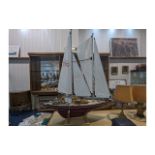 A Large Hand Built Model Yacht typical f